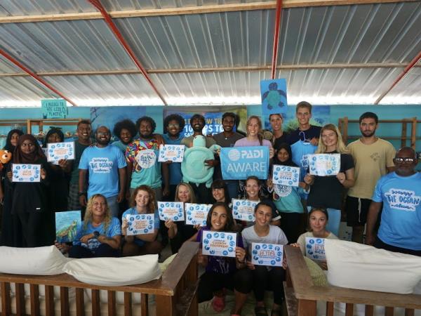 Family volunteering with turtles in the Maldives