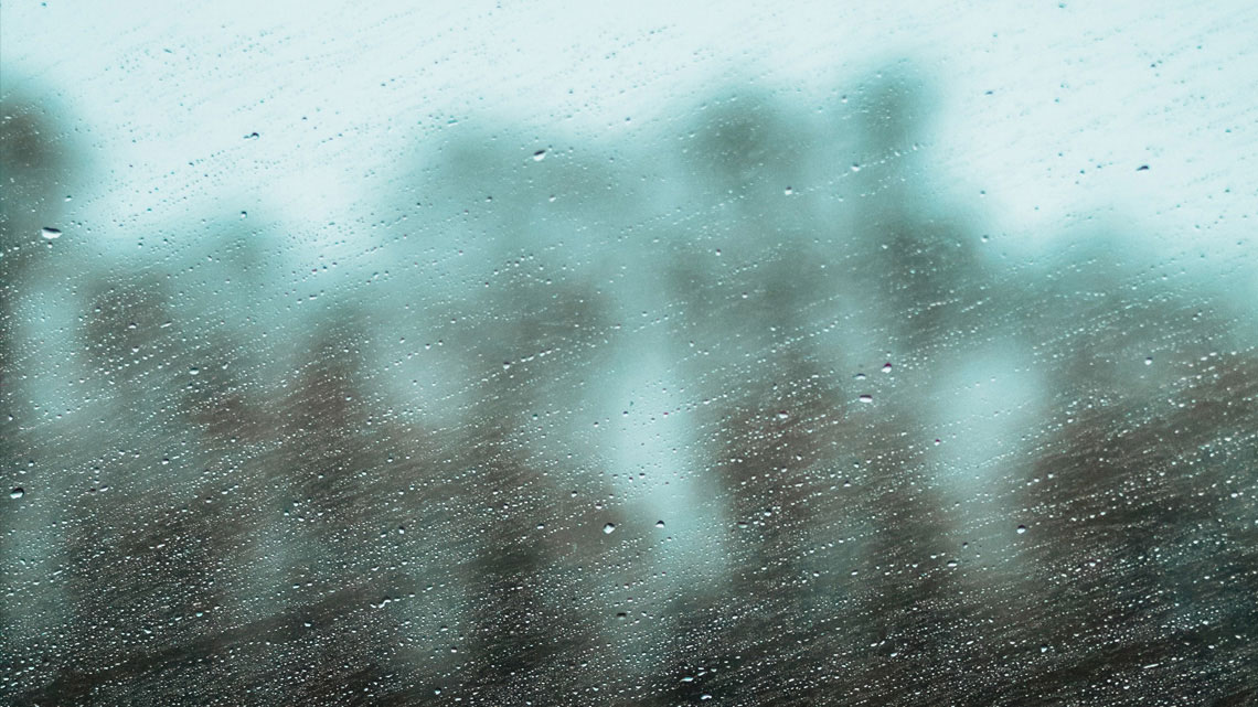 View through a rain-splattered window